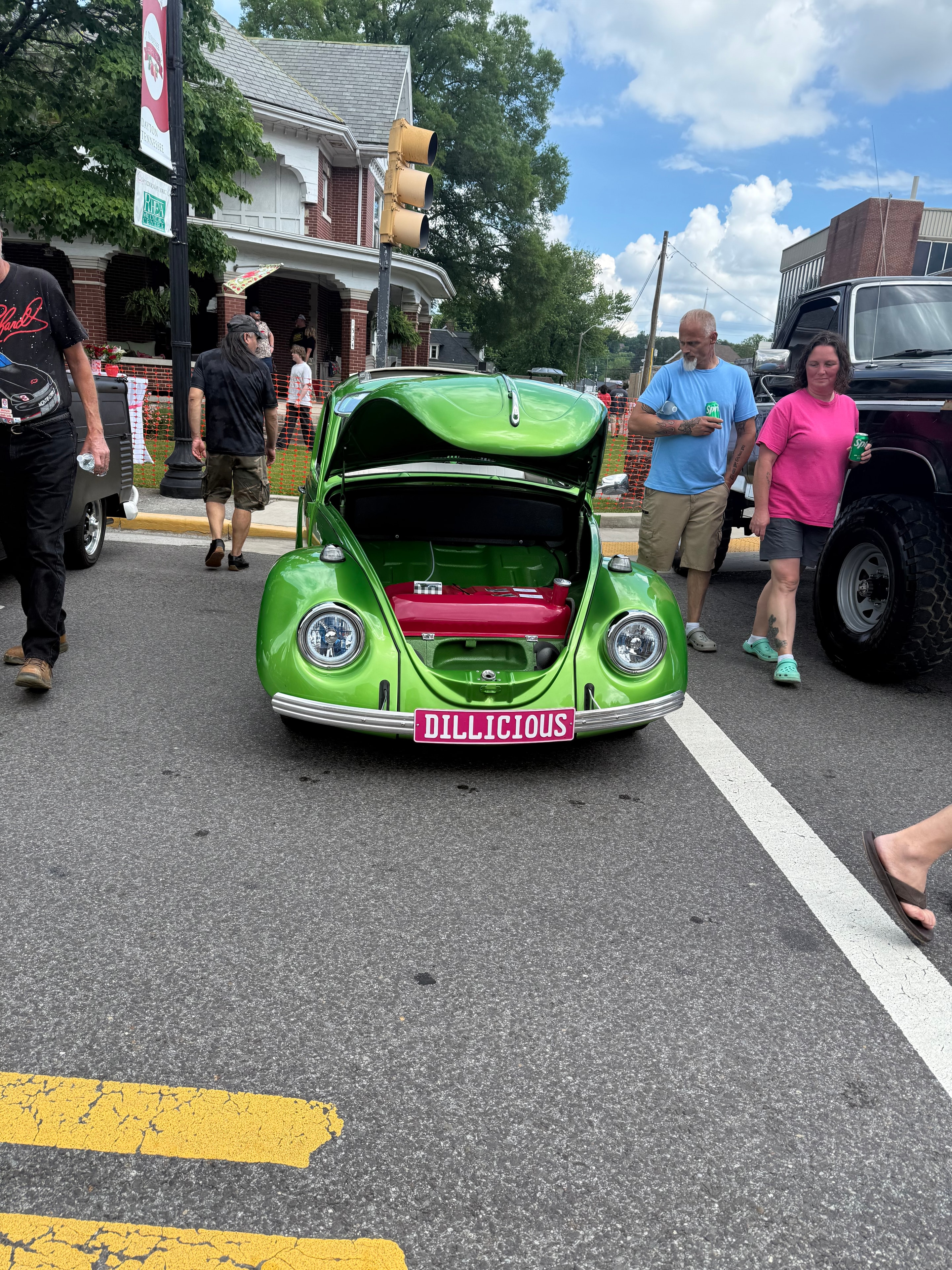 Bright green vintage VW Beetle at a small town car show